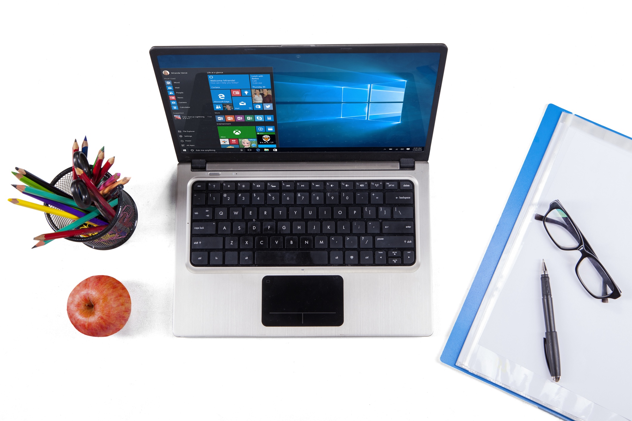 photo illustration of a laptop on a desk for learning to use windows