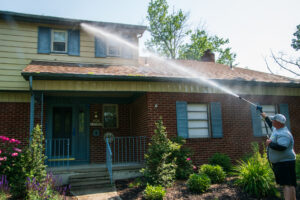 Pressure washing houses can be a great way to earn extra income when the weather is nice.